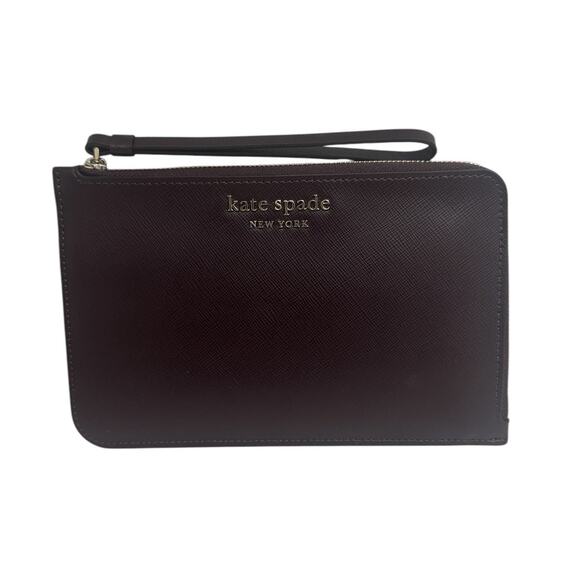 Kate spade Wrislet Chocolate color damage - Picture 1 of 8